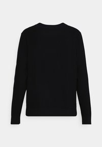 Maglione a maglia blu navy con maniche lunghe e colletto rotondo. Presenta una texture a coste sui polsini e sull'orlo. Design semplice e classico.