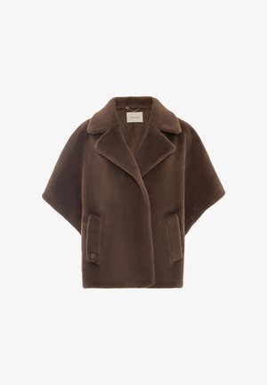 Brown, oversized coat with a soft texture, peak lapels, and two front pockets. Features a minimalistic design without closures.