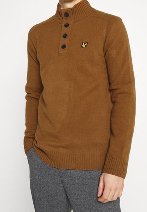 Stickad tröja - light brown