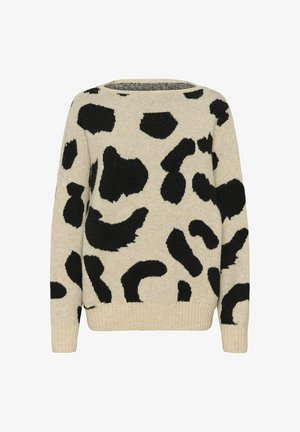 Ljusbeige tröja med ett svart leopardmönster, stickad textur, rundad halsringning samt ribbade ärmslut och fåll.