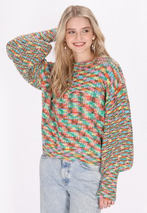 Multicolore gebreide trui met een losse, oversized pasvorm, lange mouwen, een opvallende textuur en levendige roze, groene en blauwe tinten.