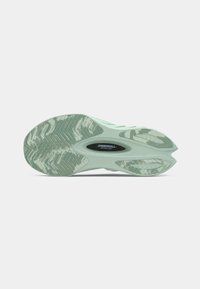 Light green athletic shoe sole with textured grip pattern and Speedroll technology branding in black, featuring a smooth, contoured shape.