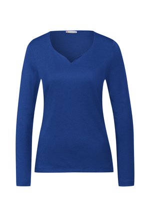 Långärmad topp med V-ringning i en enfärgad kunglig blå nyans, tillverkad av ett mjukt, slätt tyg med en enkel, klassisk skärning. Basdesign utan mönster.