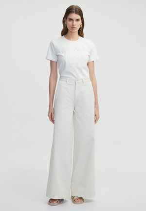 WIDE - Flared Jeans - natural