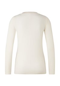 Langermige, crèmekleurige top met een ronde halslijn en een gladde textuur. Bevat een rechte naad op de rug en aansluitende mouwen.