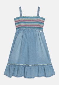 Denim dress with a smocked bodice in multicolored stripes and a flared, ruffled hem. Adjustable straps and a subtle decorative accent at the waist.