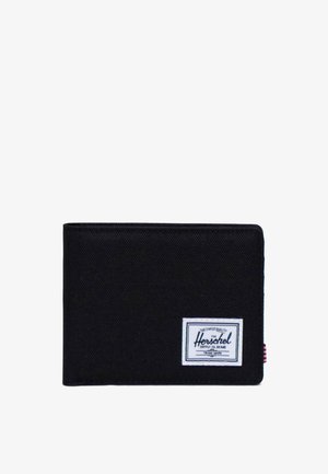 Black fabric wallet with a rectangular shape, featuring a white Herschel label on the front and red-striped accent on the side.