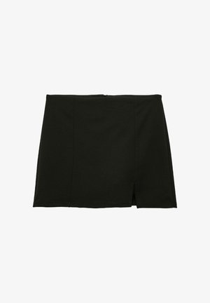 Zwarte rok van rekbaar materiaal, met een slanke pasvorm, een ritssluiting aan de achterkant en een split aan de voorkant voor optimale bewegingsvrijheid. Strakke lijnen en een gladde textuur.