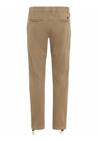 Beige leichte Hosen mit elastischem Bund, zwei Gesäßtaschen, verstärkten Kniebereichen und verstellbaren Knöchelbündchen.
