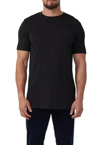 Zwart T-shirt met korte mouwen van katoen, met een ronde hals en een subtiele logodetail op de borst, met een gladde textuur.