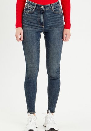- Jeansy Skinny Fit