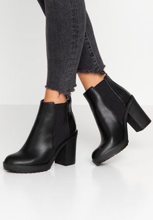 Bottines à talons hauts - black