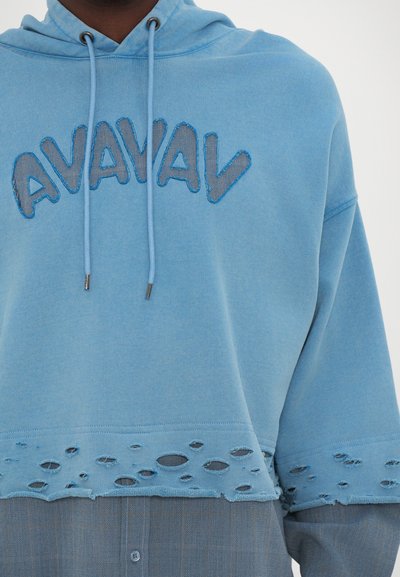 Light blue hoodie featuring a distressed hem with cutouts, and the word "AVAVAV" in a contrasting embroidered design.