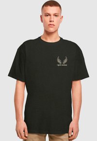 Merchcode CUPIDS ASSISTANT HEAVY TEE - T-shirts print - black