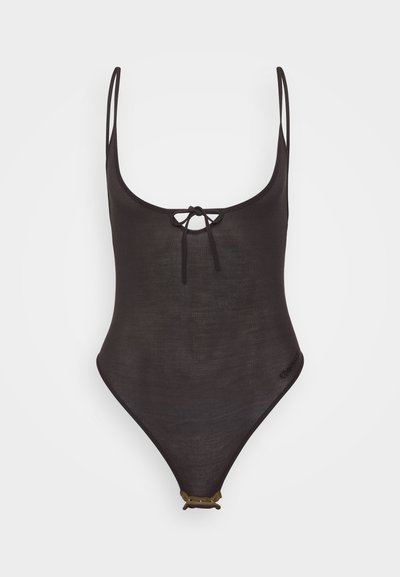 Black one-piece swimsuit with thin straps, center tie detail, textured fabric, high-cut legs, and a gold-toned hardware accent at the back.