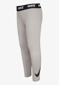 Γκρι αθλητικό κολάν με στενή εφαρμογή, μαύρο λογότυπο Nike και ζώνη μέσης, κατασκευασμένο από λείο, ελαστικό υλικό, με καθαρές ραφές.
