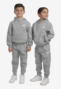 Nike Sportswear CLUB PANT UNISEX - Calças de fato de treino - dark grey