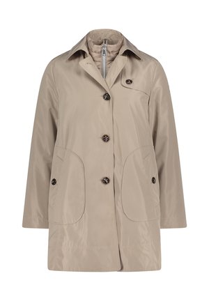 Beige waterproof coat made of smooth fabric, featuring a collar, front button closure, and two large pockets with rounded edges.