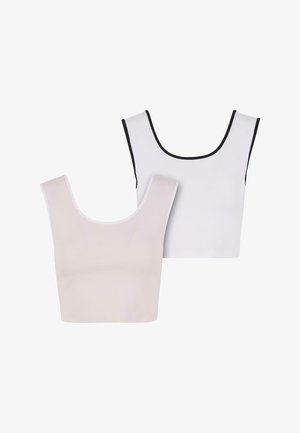 Kaks pehmest kangast crop topi; üks heledat beeži värvi valgete servadega, teine valge mustade servadega. Mõlemal on laiad rihmad ja ümar kaelus.