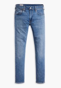 Jean en denim bleu coupe slim, fermeture avant par bouton et zip, avec cinq poches, présenté sur fond blanc.