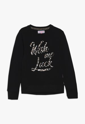 Sweatshirt noir à col rond, avec l'inscription "Souhaite-moi bonne chance" en imprimé léopard. Tissu doux, poignets et ourlet côtelés.