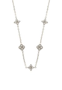 Naszyjnik z srebrnym łańcuszkiem, składający się z ogniw w kształcie kwiatów z przezroczystymi cyrkoniami w centrum, naprzemiennie z mniejszymi okrągłymi ozdobami.