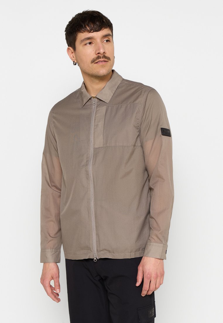 Barbour International Lichte jas taupe