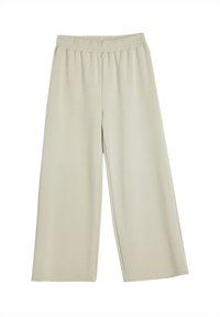Beige wijde broek van zacht, rekbaar materiaal met een elastische tailleband en een gladde textuur, zonder zichtbare patronen of accenten.