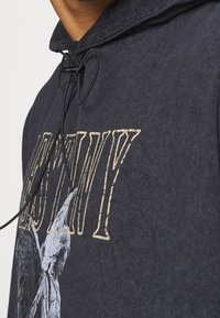 Night Addict Luvtröja - black