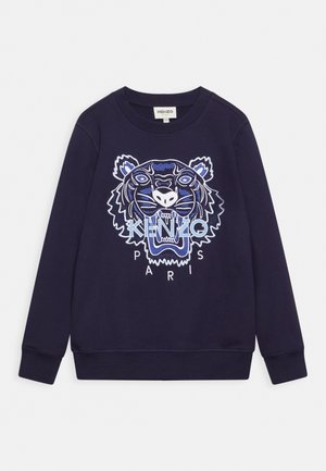 Granatowa bluza z dużą haftowaną głową ryczącego tygrysa oraz napisem "KENZO PARIS" z przodu, z okrągłym dekoltem i ściągaczami przy rękawach.