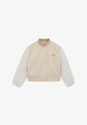 Beež ja valge bomberjakk kummist varrukaservadega, kahe eesmise tasku ja vasakul rinnal tikitud "TEAM Blue".