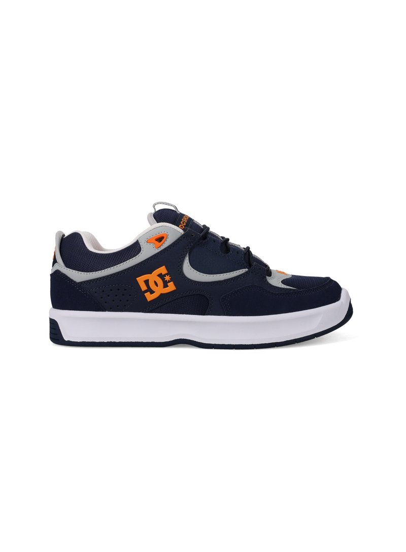 Navy blue athletic shoes with gray accents, featuring a rubber sole, lace-up design, and orange logo detail on the side.