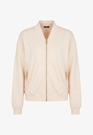 Giacca bomber beige con zip, collo, polsini e orlo a coste, e dettaglio a catena dorata sulle tasche anteriori.