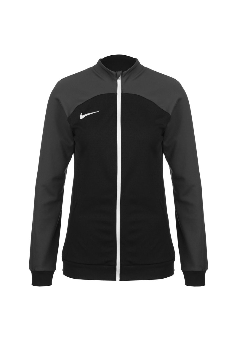 Schwarz- und graue Sportjacke mit Reißverschluss vorne, hohem Kragen und weißem Nike-Logo. Verfügt über kontrastierende Einsätze und elastische Bündchen. Aus weichem Stoff.