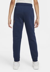 Nike Sportswear CLUB PANT UNISEX - Verryttelyhousut - midnight navy/midnight navy/(white)