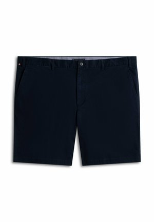 Dunkelmarineblaue Herren-Shorts mit Vordertaschen, Knopfverschluss, Gürtelschlaufen und einem kleinen roten, weißen und blauen Flaggen-Detail an der Seite.