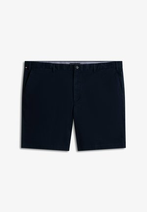 Granatowe męskie szorty z przednimi kieszeniami, zapięciem na guziki, szlufkami na pasek oraz małym detalem w postaci czerwono-biało-niebieskiej flagi z boku.