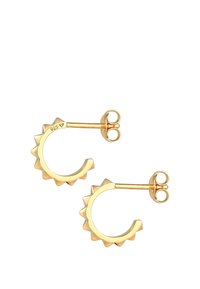 Cercei din metal de nuanță aurie, cu o formă de inel, având un design cu margine zimțată. Spate cu prindere prin post pentru comoditate în purtare. Marcaj 925.
