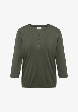 Zelená halenka s dlouhým rukávem, kulatým výstřihem, třemi knoflíky vpředu a elastickým lemem, označená jako "Cecil."