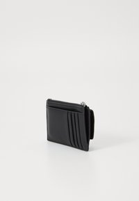 Calvin Klein MUST ZIP FLAP  - Lommebok - black mono