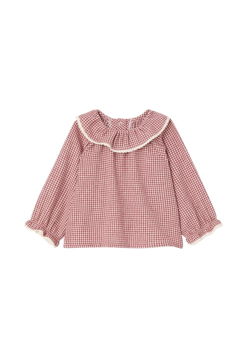 Rote Gingham-Bluse mit langen Ärmeln, Rüschensaum und Spitzenbesatz. Sie hat einen gerafften Ausschnitt und elastische Manschetten. Aus Baumwollmaterial.