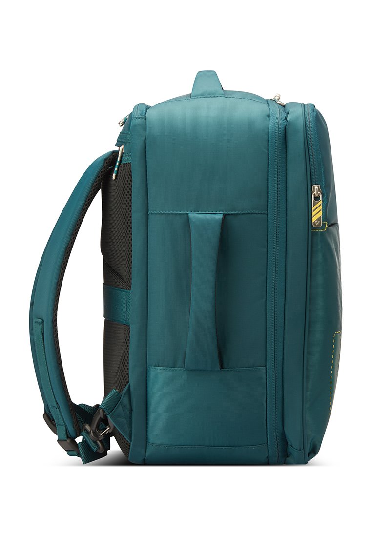 Zaino turchese con tessuto imbottito, manico laterale, zip e dettagli in rete. Presenta una base piatta e un design strutturato per la stabilità.