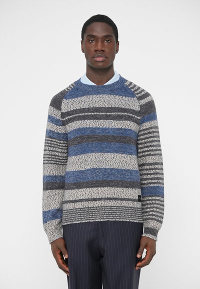 Pullover sweater with a mix of blue, gray, and cream horizontal stripes, textured knit, crew neck, and raglan sleeves.