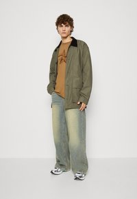 Jaded London COLOSSUS BAGGY - Vrečaste kavbojke - light blue denim