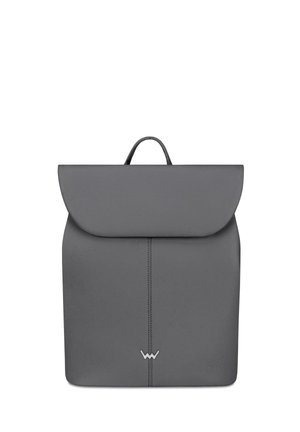 Gray leather backpack with a rounded flap, top handle, and vertical stitching detail. Features a minimalist design and embossed logo.