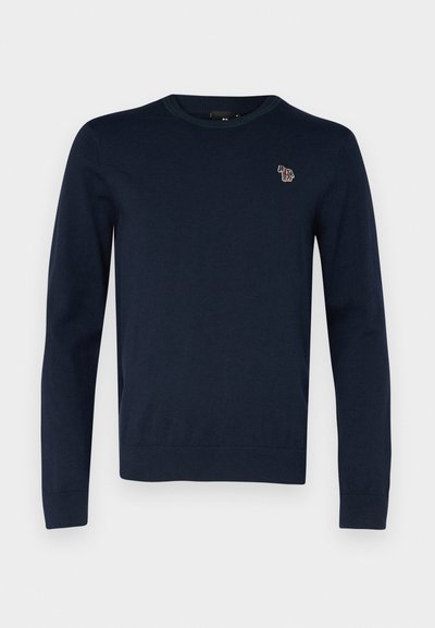 Navy blue knit sweater with a round neckline, long sleeves, and a small embroidered design of an animal on the chest. Soft texture, ribbed hem.