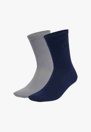 Skarpety za kostkę z mieszanki bawełny w ciemnoniebieskim i jasnoszarym kolorze. Prążkowana faktura, jednolite kolory oraz akcent z logo z boku.