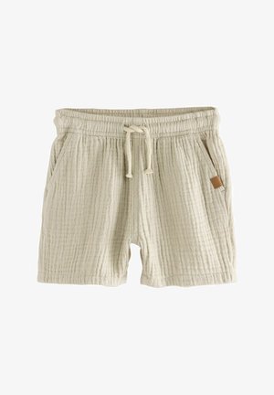 Beige, strukturierte Baumwollshorts mit elastischem Bund, Kordelzug und Seitentaschen. Beinhaltet ein kleines Lederetikett auf der Vorderseite.