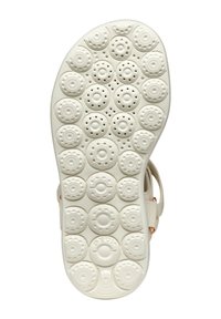 Suola di scarpa in gomma bianca con motivi circolari e fori ventilati, dal texture liscia e con logo "GEOX" sul tallone.
