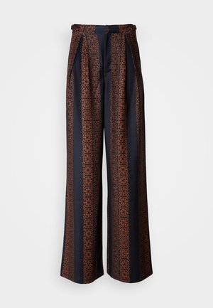 Wide-leg trousers in dark blue fabric featuring an intricate orange geometric pattern, with pleated front and a fitted waistband.